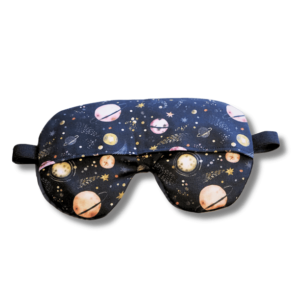 Weighted eye mask with a galaxy design on a transparent background