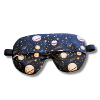 Weighted eye mask with a galaxy design on a transparent background