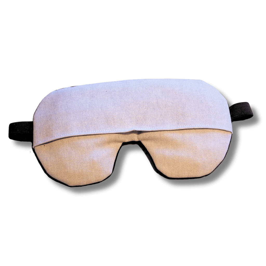 Weighted eye mask with a pastel lilac design on a transparent background