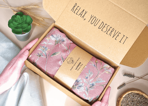 Microwave Wheat Bag with a pink floral design in a gift box
