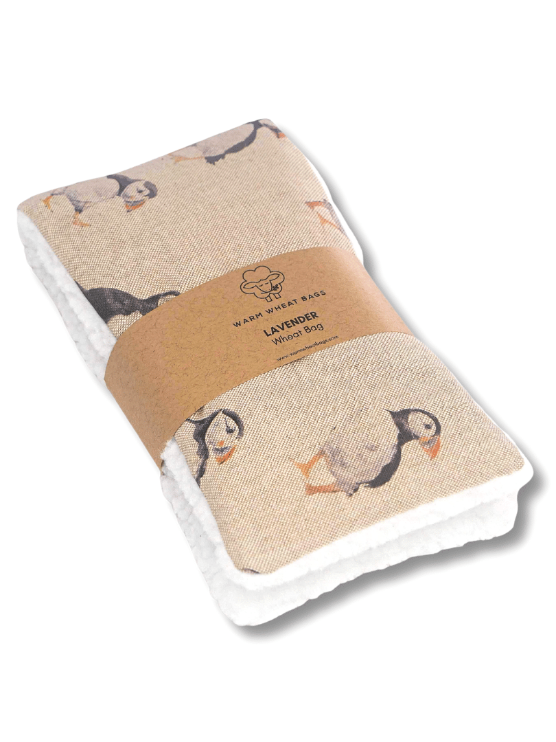 Microwave Wheat Bag with a puffin design on a transparent background