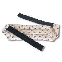 Wearable microwave wheat bag belt with a bees design on a transparent background