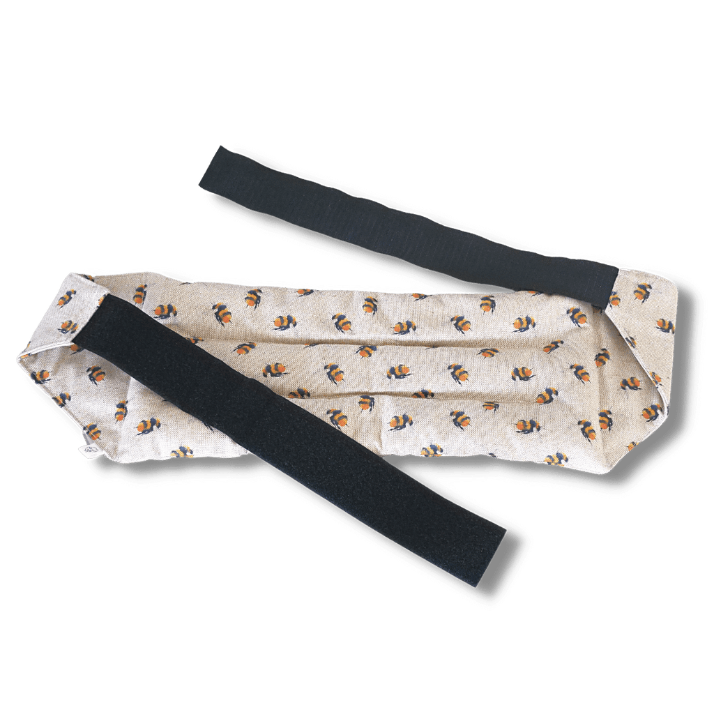 Wearable microwave wheat bag belt with a bees design on a transparent background